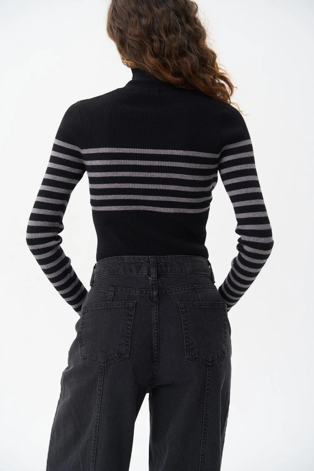 Black turtleneck sweater with a grey stripe